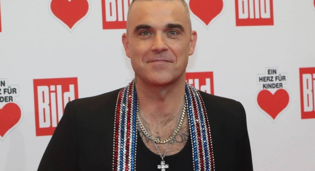 Robbie Williams wraca do zespołu Take That. Ale tylko na jeden koncert